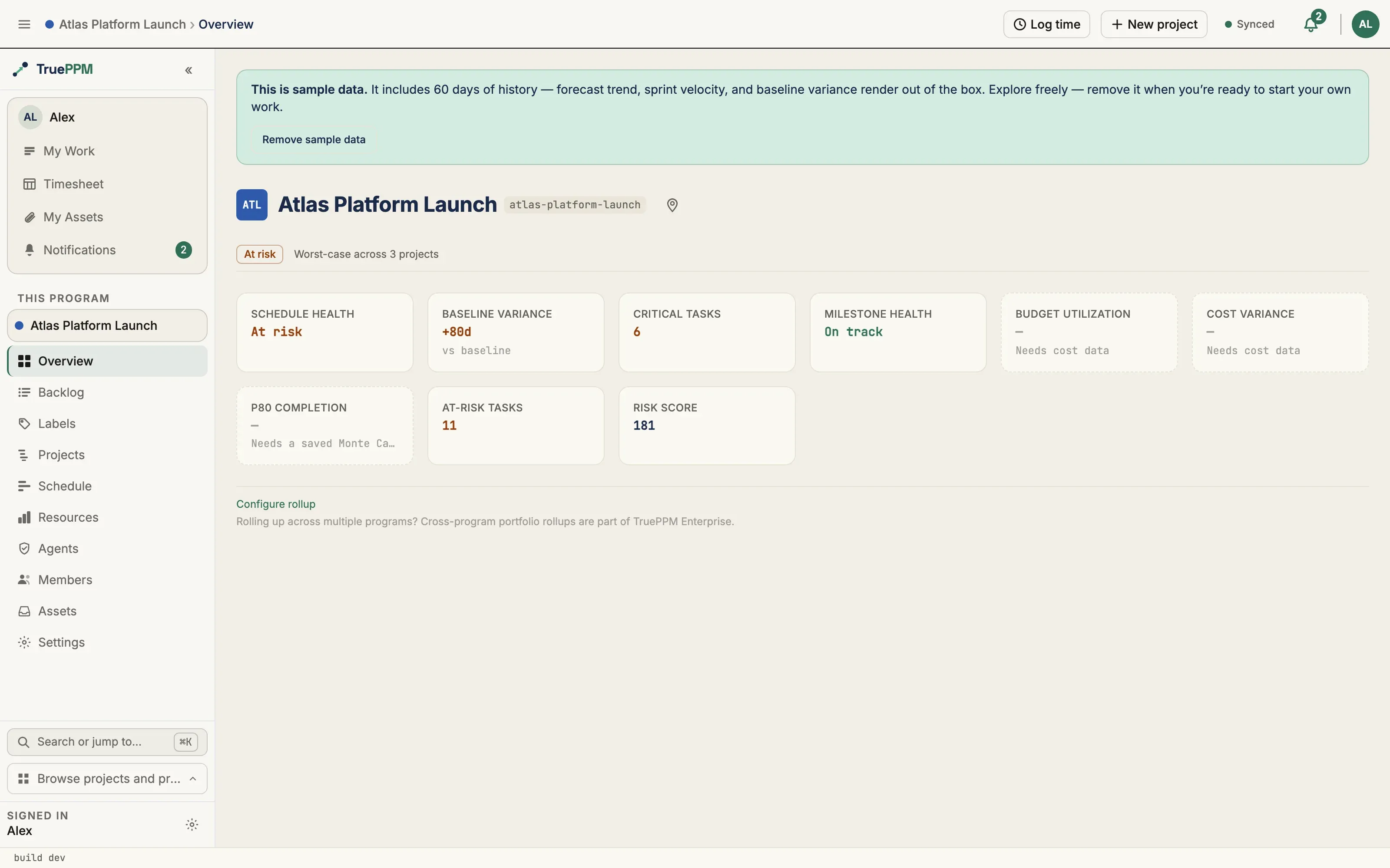 A TruePPM program overview: schedule health, baseline variance, critical tasks, milestone health, P80 completion, at-risk tasks and risk score tiles, rolled up from three projects